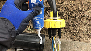 Sealing an underground cable housing with Weiconlock SI 303-31
