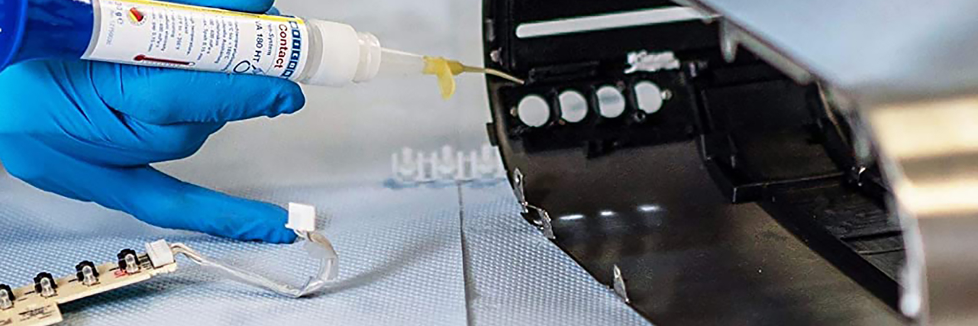 Banner Image Showing the Gluing an electrical enclosure with VA 180 High Heat Super Glue
