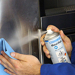 Metal Fluid Spray used to clean, polish and protect and metal door exa_11580400